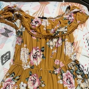 Orange with flowers a great romper for summer.!